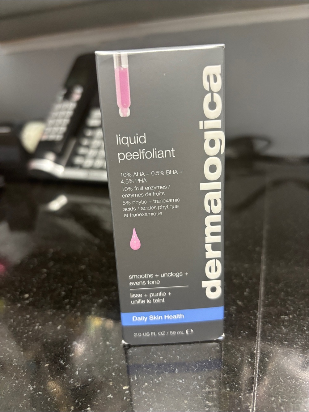 dermalogica Liquid Peelfoliant – Pink on Black Box
